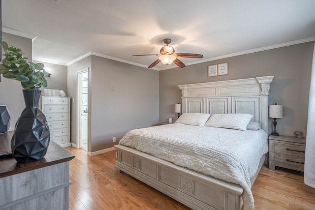 bedroom with light wood-type flooring, crown molding, baseboards, and ceiling fan