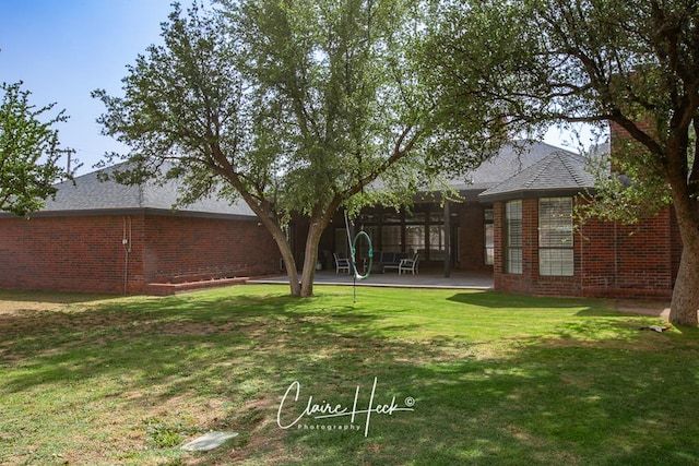 4300 Tumbleweed Trl, Midland, TX 79707 - view of green lawn featuring a patio area