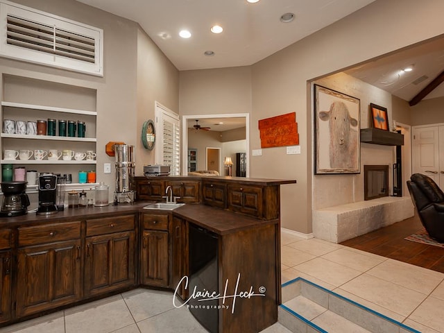 4300 Tumbleweed Trl, Midland, TX 79707 - bar with light tile patterned floors, a sink, a ceiling fan, recessed lighting, and built in shelves