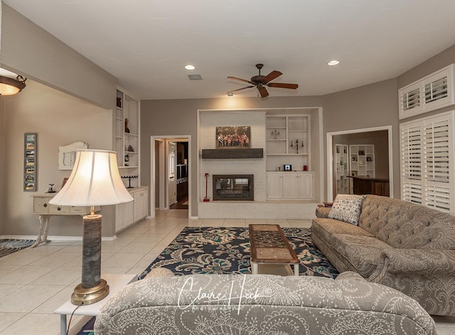 4300 Tumbleweed Trl, Midland, TX 79707 - living room featuring built in shelves, tile patterned flooring, ceiling fan, baseboards, and recessed lighting