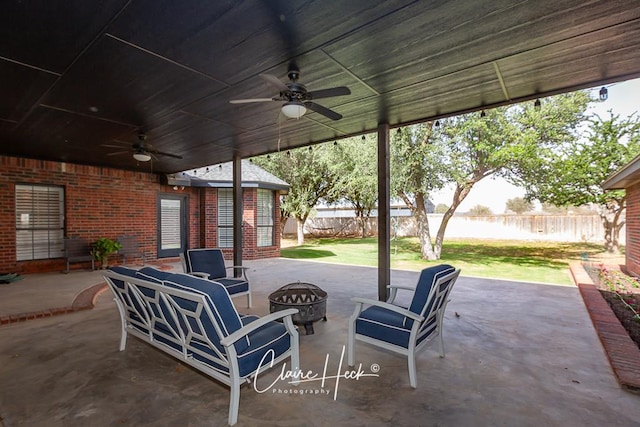 4300 Tumbleweed Trl, Midland, TX 79707 - view of patio with ceiling fan and a fire pit