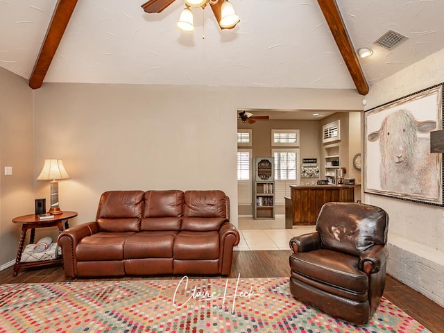 4300 Tumbleweed Trl, Midland, TX 79707 - living area featuring ceiling fan, beam ceiling, and wood finished floors