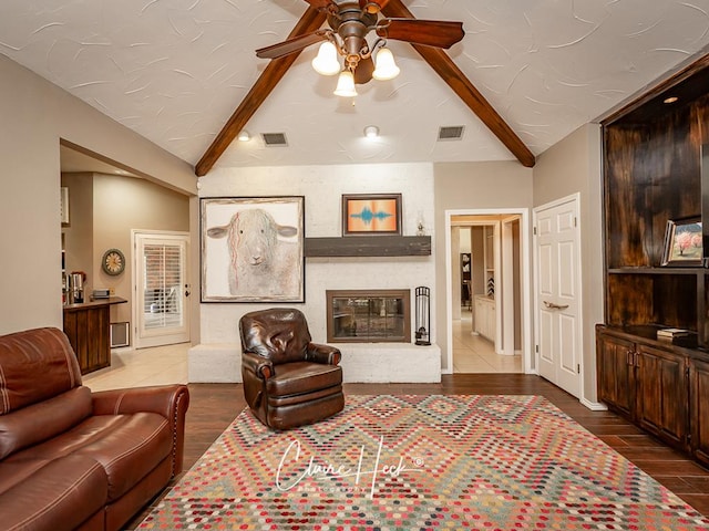 4300 Tumbleweed Trl, Midland, TX 79707 - living room with ceiling fan, a fireplace, and wood finished floors