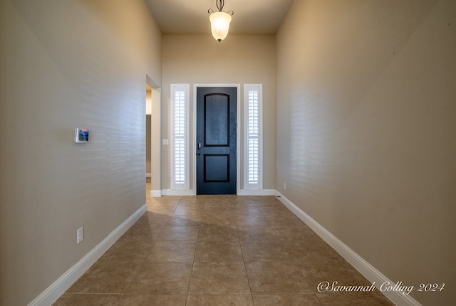 view of tiled foyer entrance