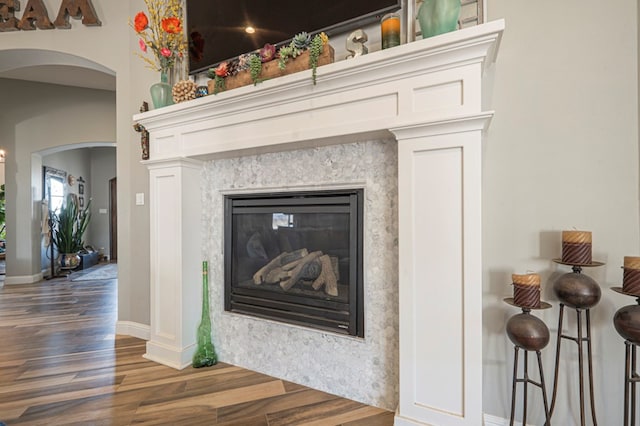 interior details featuring hardwood / wood-style flooring