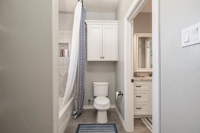 full bathroom featuring shower / bathtub combination with curtain, vanity, tile patterned floors, and toilet