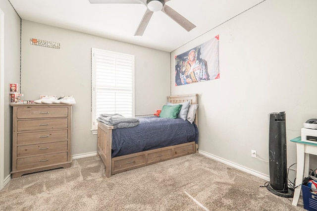 bedroom with light carpet and ceiling fan