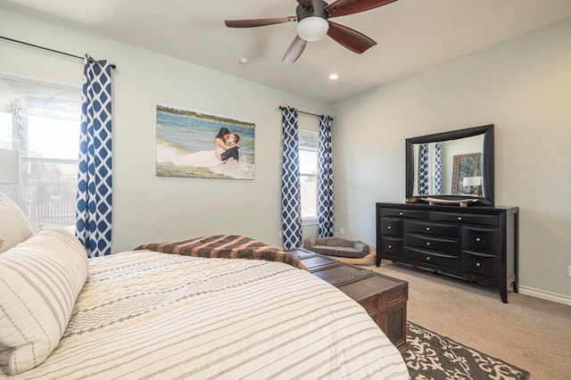 bedroom with ceiling fan and carpet flooring