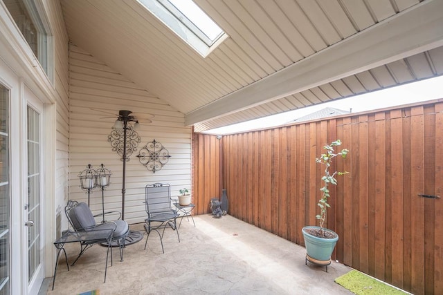 view of patio / terrace featuring fence