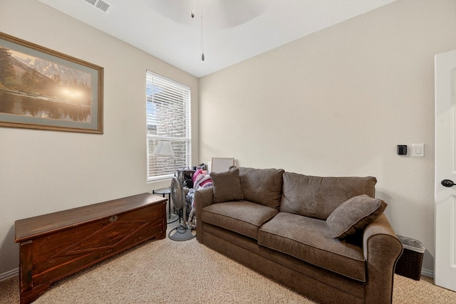 5001 Shadybrook Rd, Midland, TX 79705 - living area featuring light colored carpet, ceiling fan, and baseboards