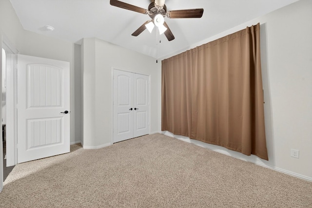 5001 Shadybrook Rd, Midland, TX 79705 - unfurnished bedroom with carpet floors, a closet, a ceiling fan, and baseboards