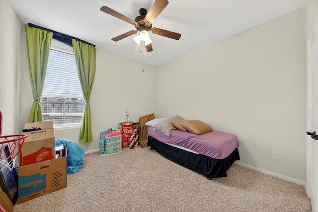 5001 Shadybrook Rd, Midland, TX 79705 - carpeted bedroom with baseboards and a ceiling fan