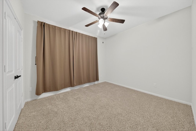 5001 Shadybrook Rd, Midland, TX 79705 - unfurnished bedroom featuring carpet flooring, baseboards, a ceiling fan, and a closet