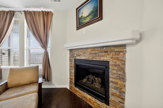 5001 Shadybrook Rd, Midland, TX 79705 - sitting room featuring a fireplace, dark wood-style floors, and baseboards