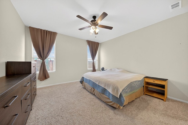 5001 Shadybrook Rd, Midland, TX 79705 - bedroom featuring carpet flooring, baseboards, and a ceiling fan