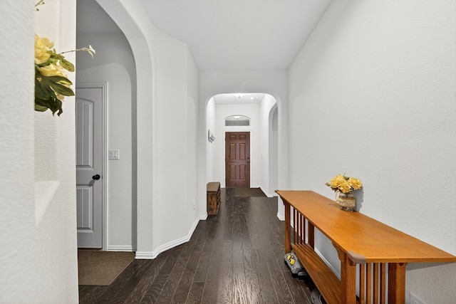 5001 Shadybrook Rd, Midland, TX 79705 - hall with arched walkways, wood-type flooring, and baseboards