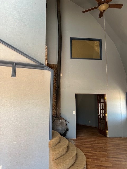 2508 22nd St, Snyder, TX 79549 - bathroom featuring high vaulted ceiling, wood finished floors, and ceiling fan