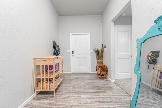 1407 Derrick Ave, Odessa, TX 79765 - corridor featuring wood finished floors and baseboards