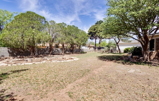 view of yard with fence