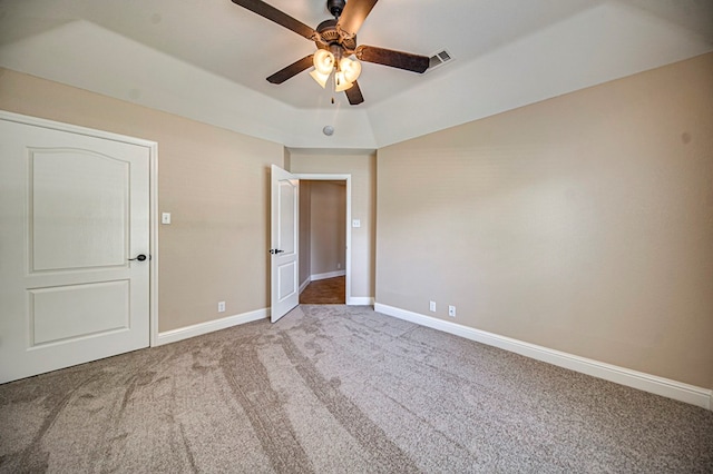 unfurnished bedroom with ceiling fan and carpet