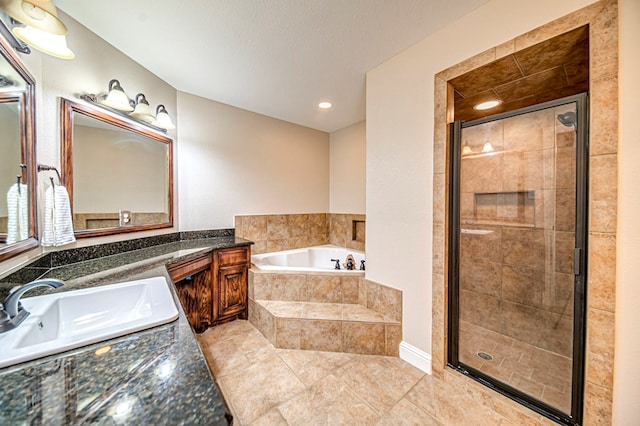 bathroom with separate shower and tub, tile patterned floors, and vanity