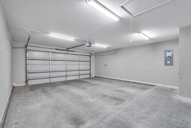 garage featuring a garage door opener and electric panel