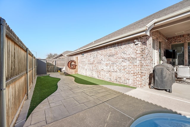 view of patio / terrace with a grill