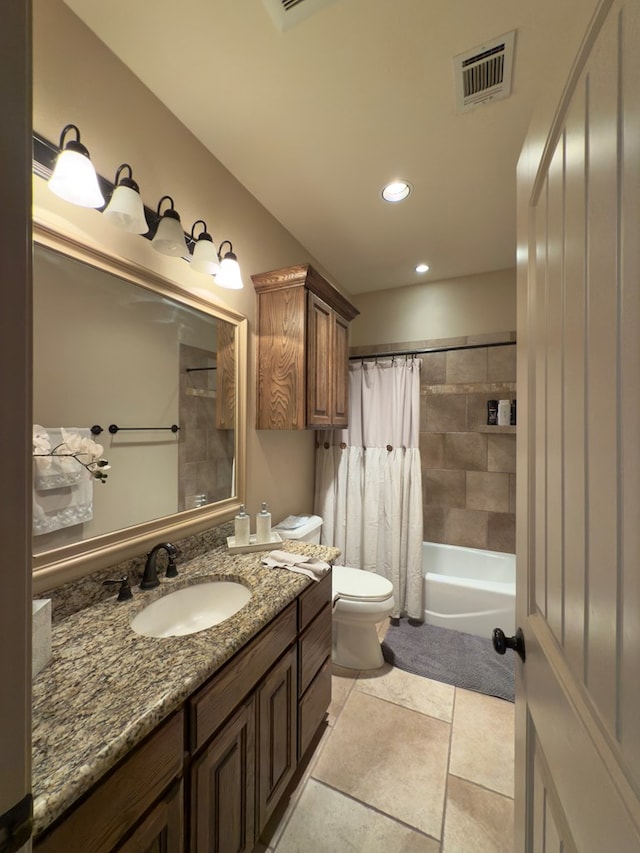 full bathroom with vanity, toilet, and shower / bath combo