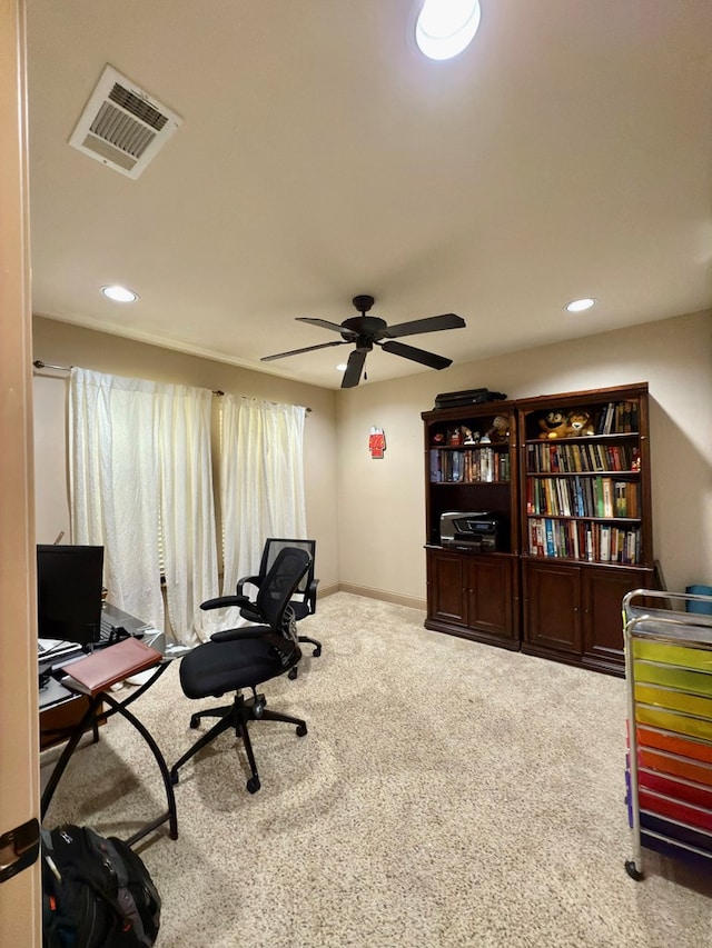 home office with carpet flooring and ceiling fan