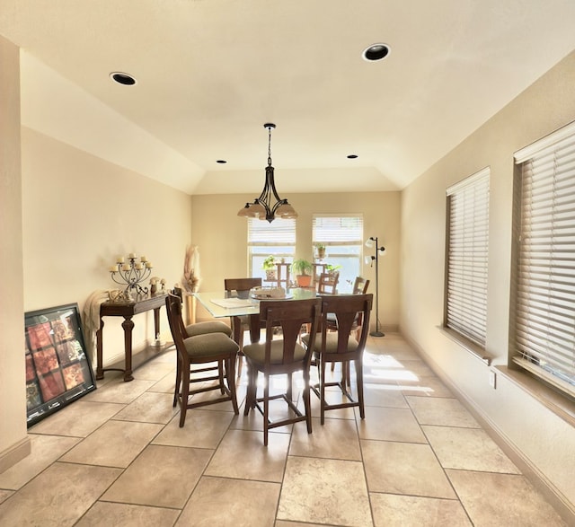 dining space with a chandelier