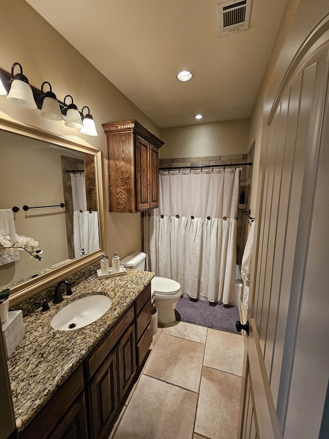 full bathroom with vanity, shower / bath combination with curtain, and toilet