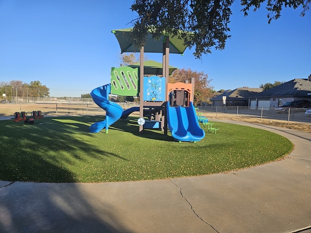 view of play area featuring a lawn