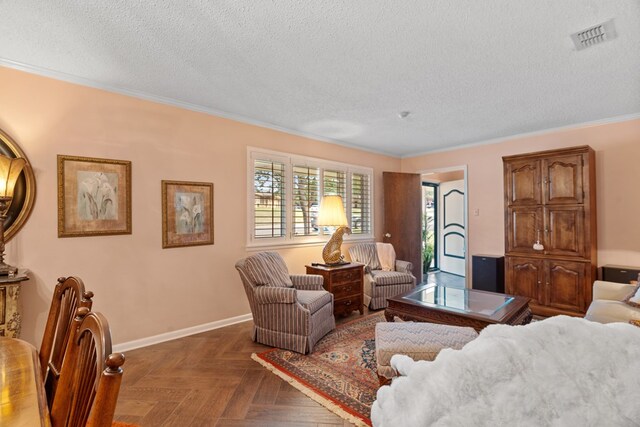 living room with dark parquet floors, a textured ceiling, and ornamental molding