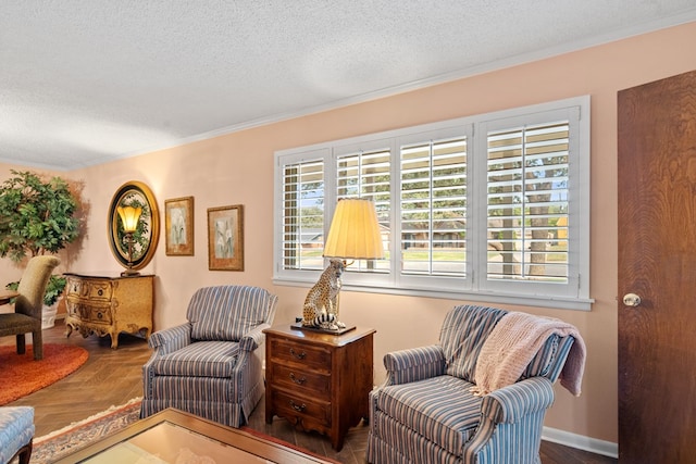 living area featuring a textured ceiling, a healthy amount of sunlight, parquet floors, and crown molding