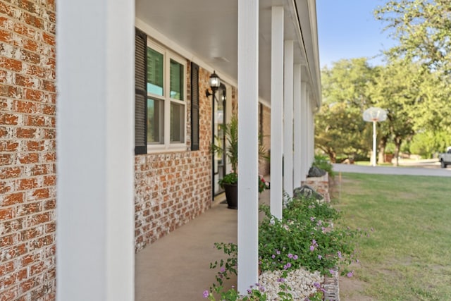 2906 Hunters Gln, Big Spring, TX 79720 - view of property exterior featuring brick siding and a porch