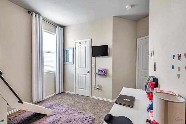 5700 San Miguel Ave, Midland, TX 79705 - home office with carpet floors and baseboards