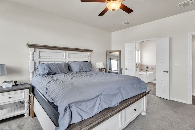 4107 Connally St, Big Spring, TX 79720 - bedroom featuring carpet, connected bathroom, and a ceiling fan