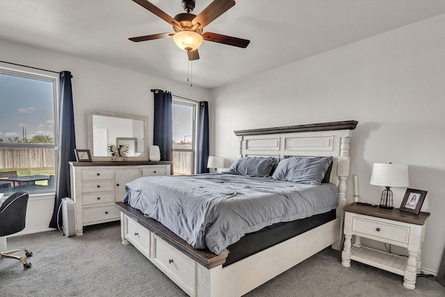 4107 Connally St, Big Spring, TX 79720 - bedroom featuring carpet flooring, multiple windows, and ceiling fan