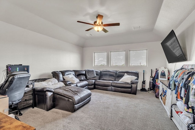 4107 Connally St, Big Spring, TX 79720 - carpeted living room with ceiling fan and lofted ceiling