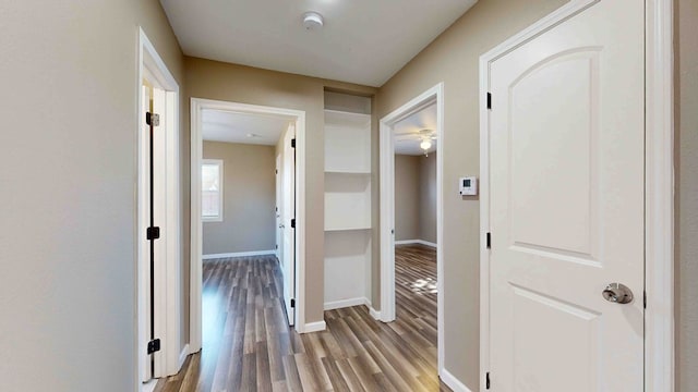 hallway featuring hardwood / wood-style floors