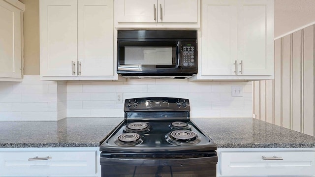 kitchen featuring black appliances, white cabinetry, backsplash, and dark stone counters