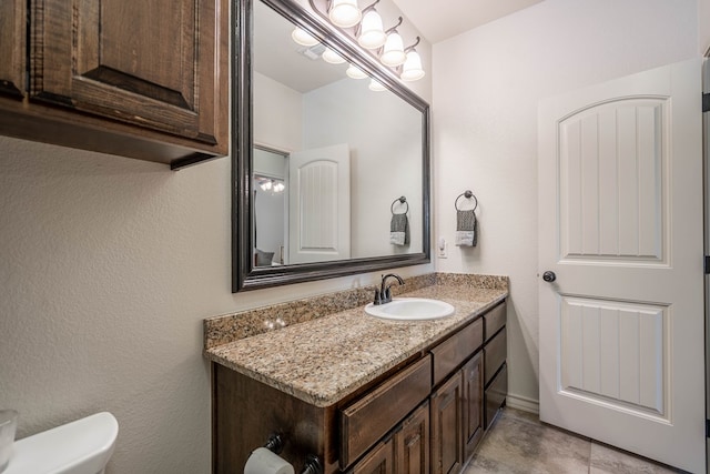 5607 Camino Reale, Midland, TX 79707 - bathroom featuring vanity and toilet