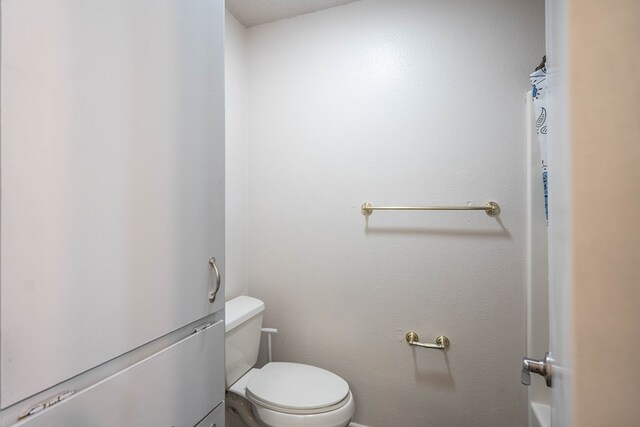 bathroom featuring toilet