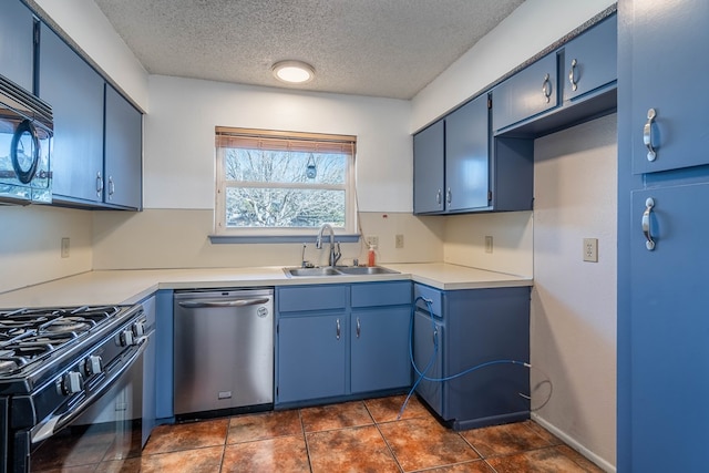 kitchen with blue cabinets, black appliances, and a sink