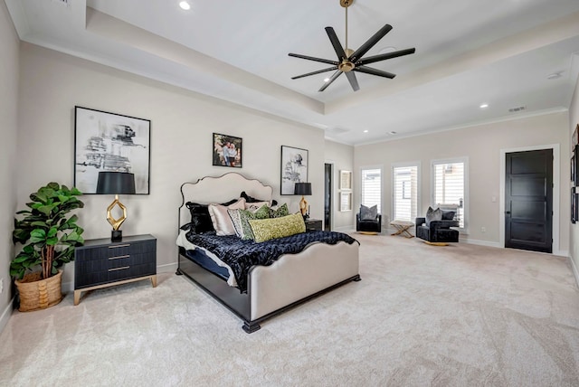bedroom featuring carpet floors, a raised ceiling, baseboards, ornamental molding, and recessed lighting