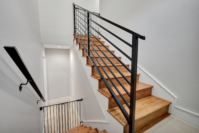 stairs with a towering ceiling