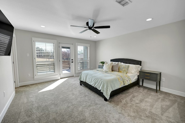 bedroom with baseboards, carpet floors, visible vents, and access to exterior