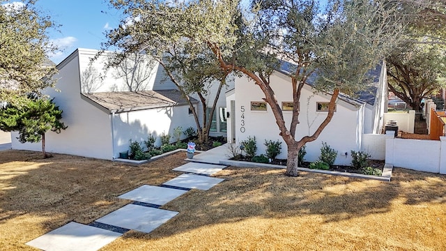 view of front of property featuring stucco siding