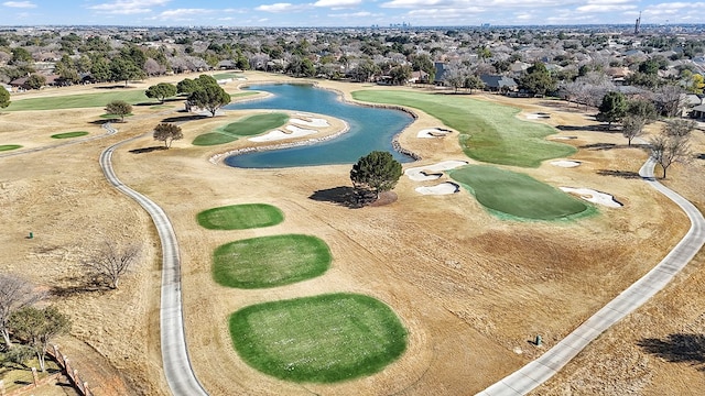 aerial view featuring view of golf course and a water view