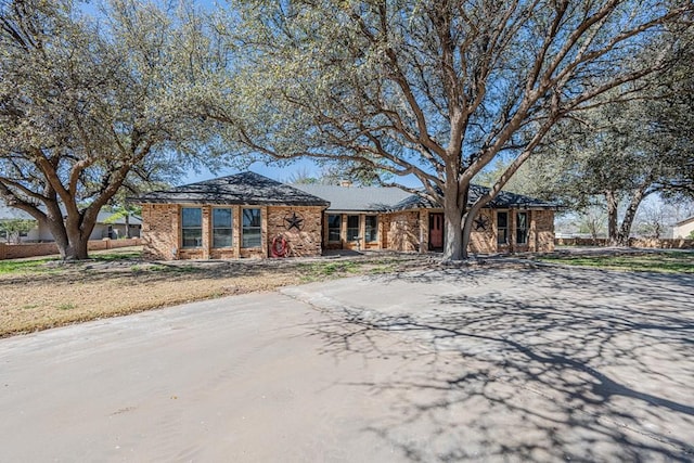 4009 Kniffen Dr, Midland, TX 79705 - view of front facade with brick siding